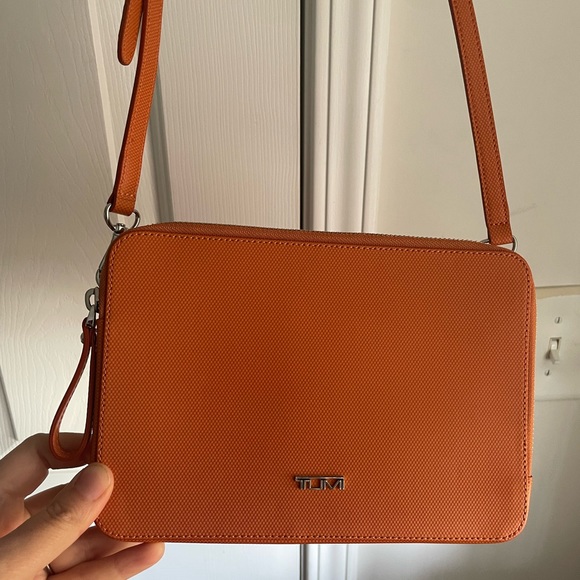 Tumi Handbags - Tumi Orange Crossbody Bag